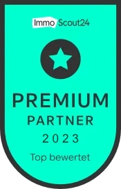 Ein Logo Zeigt Immo Scout24 Premium Partner 2023 Top Bewertet Auf Einem Türkisen Hintergrund Mit Einem Sternsymbol